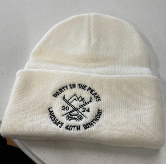 Embroidered baseball cap with a stitched company logo