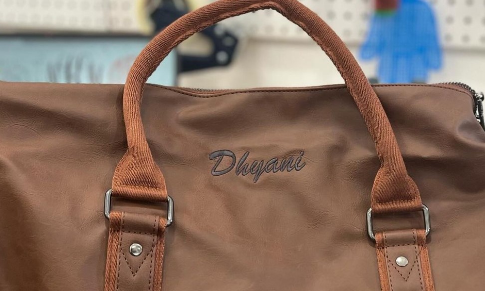 Monogrammed leather goods embroidered in Brick NJ